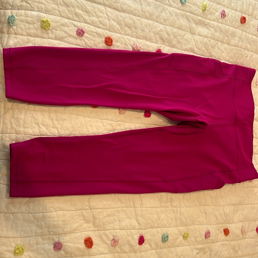 Lululemon leggings size 12, ripened raspberry pink. 23 inches inseam.